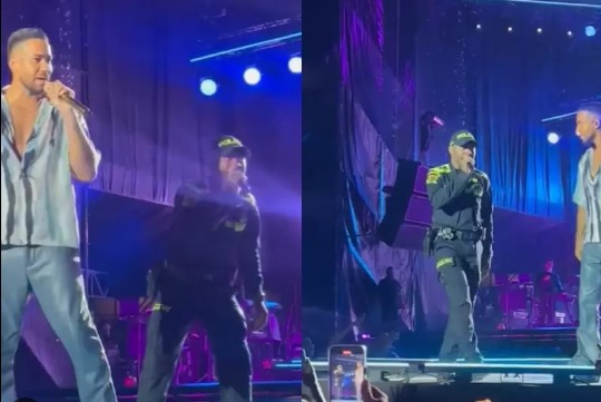 Severa cantanda: policía sorprendió con su interpretación de ‘ella y yo’ con Romeo Santos